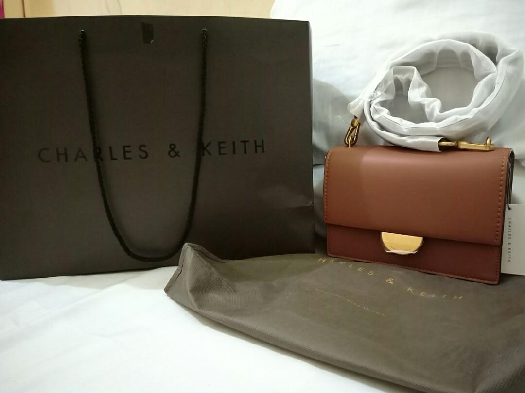charles and keith metallic accent push lock bag