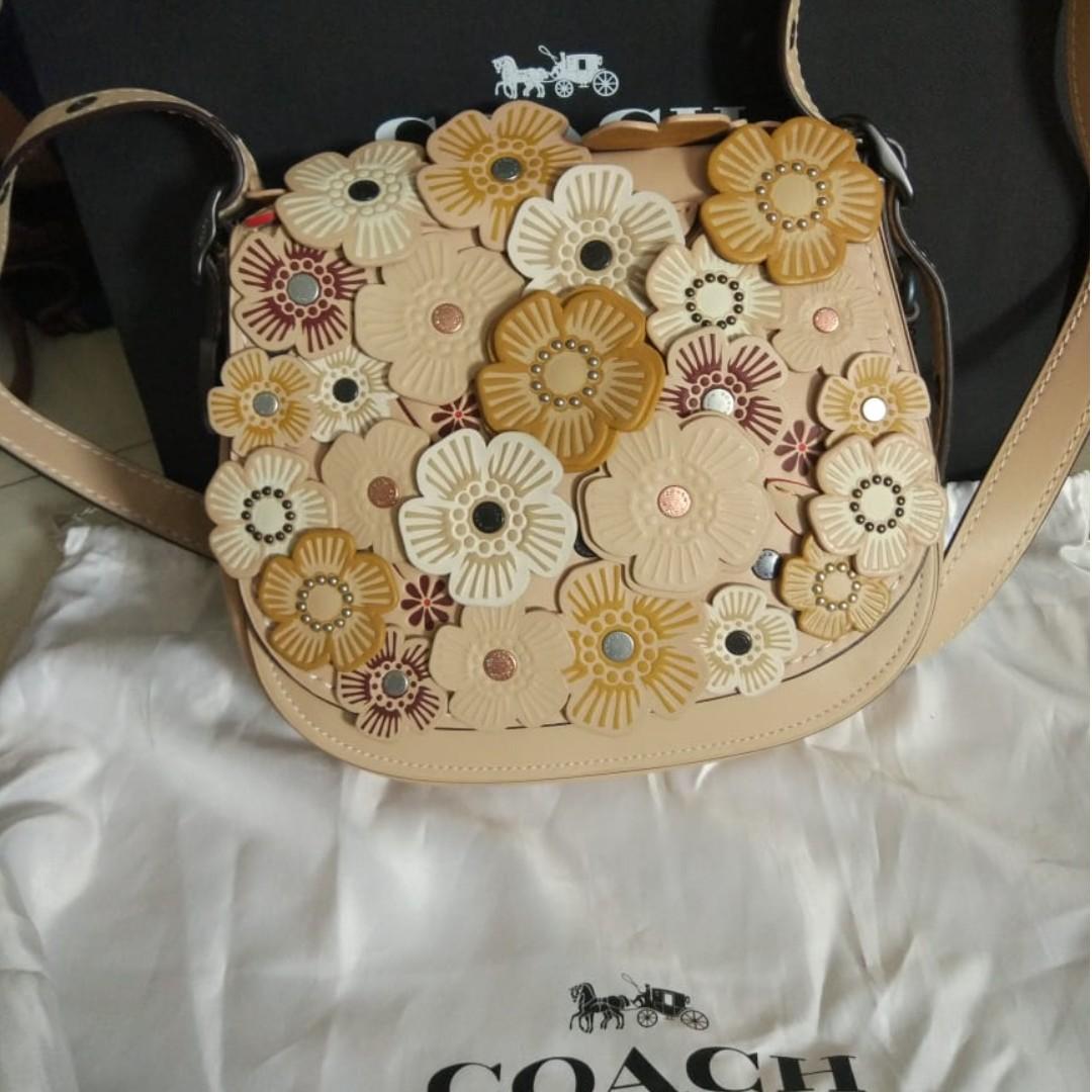 Coach tea rose saddle bag on sale
