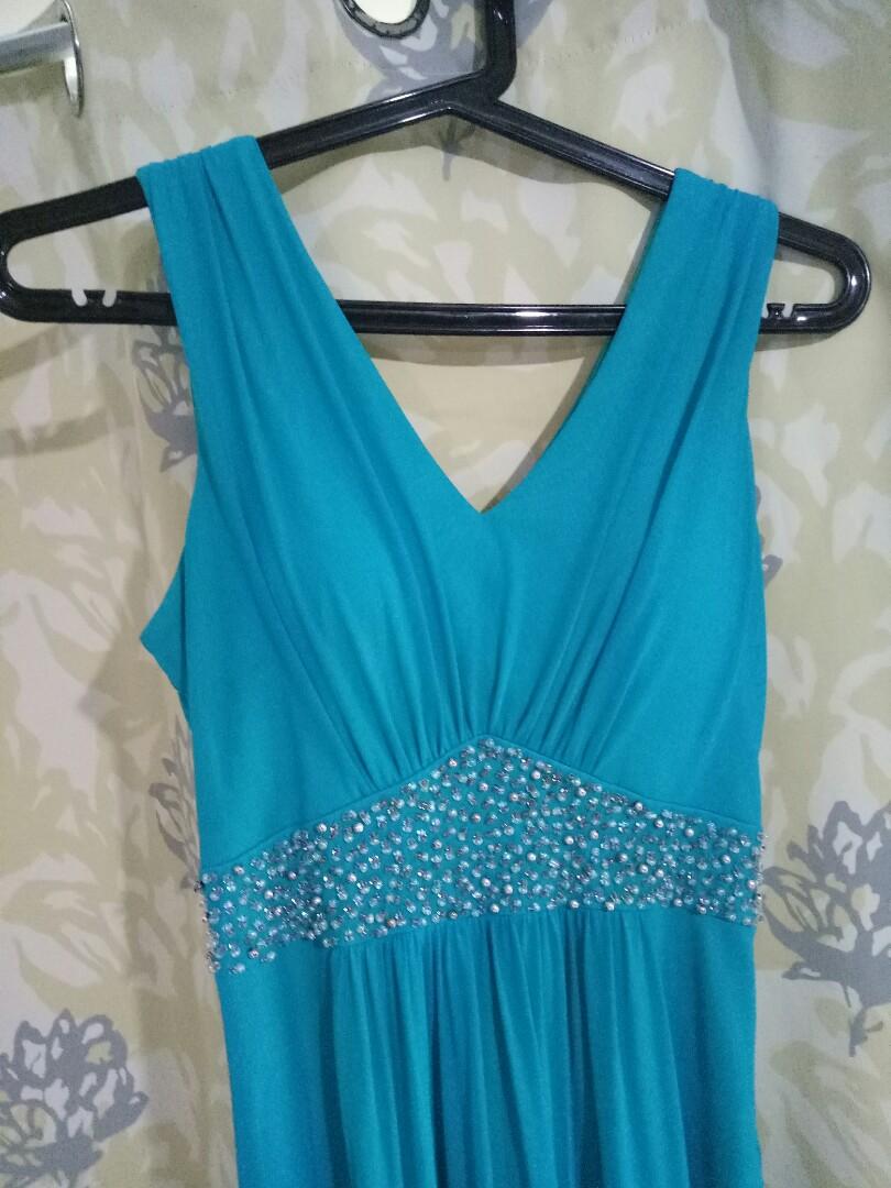 Long Formal Dress Teal Color (Category: Dresses) located in Manila. Submitted by lynn0620 (Listing ID 200567610, Image 2). Description: Good as New Fits S - M Chest size fits til 37B.