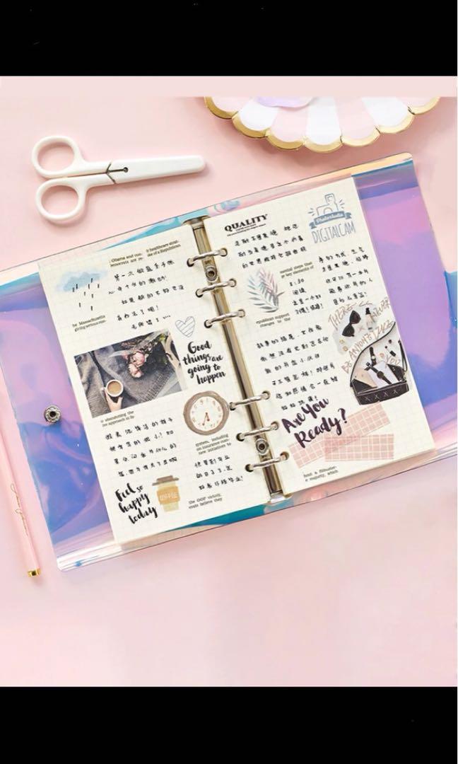 Notebook (Category: Stationery & School Supplies) located in Singapore. Submitted by the.r0sie_ (Listing ID 200584129, Image 3). Description: Preorder! -will come in 15-25days -holographic+waterproof cover Meet ups at -Woodlands to Jurong east to Boon Lay(only sun) -Boon Lay (other days).
