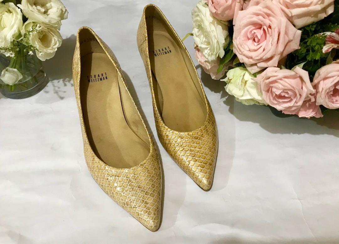 cream snakeskin shoes