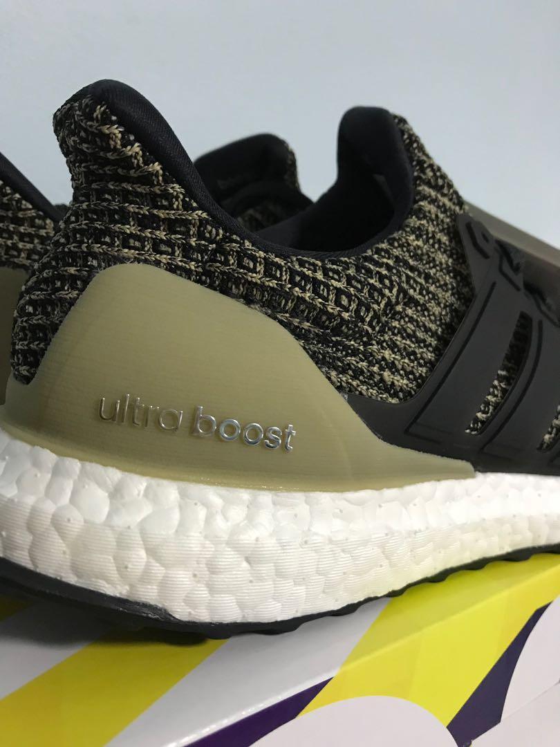 adidas ultra boost black raw gold