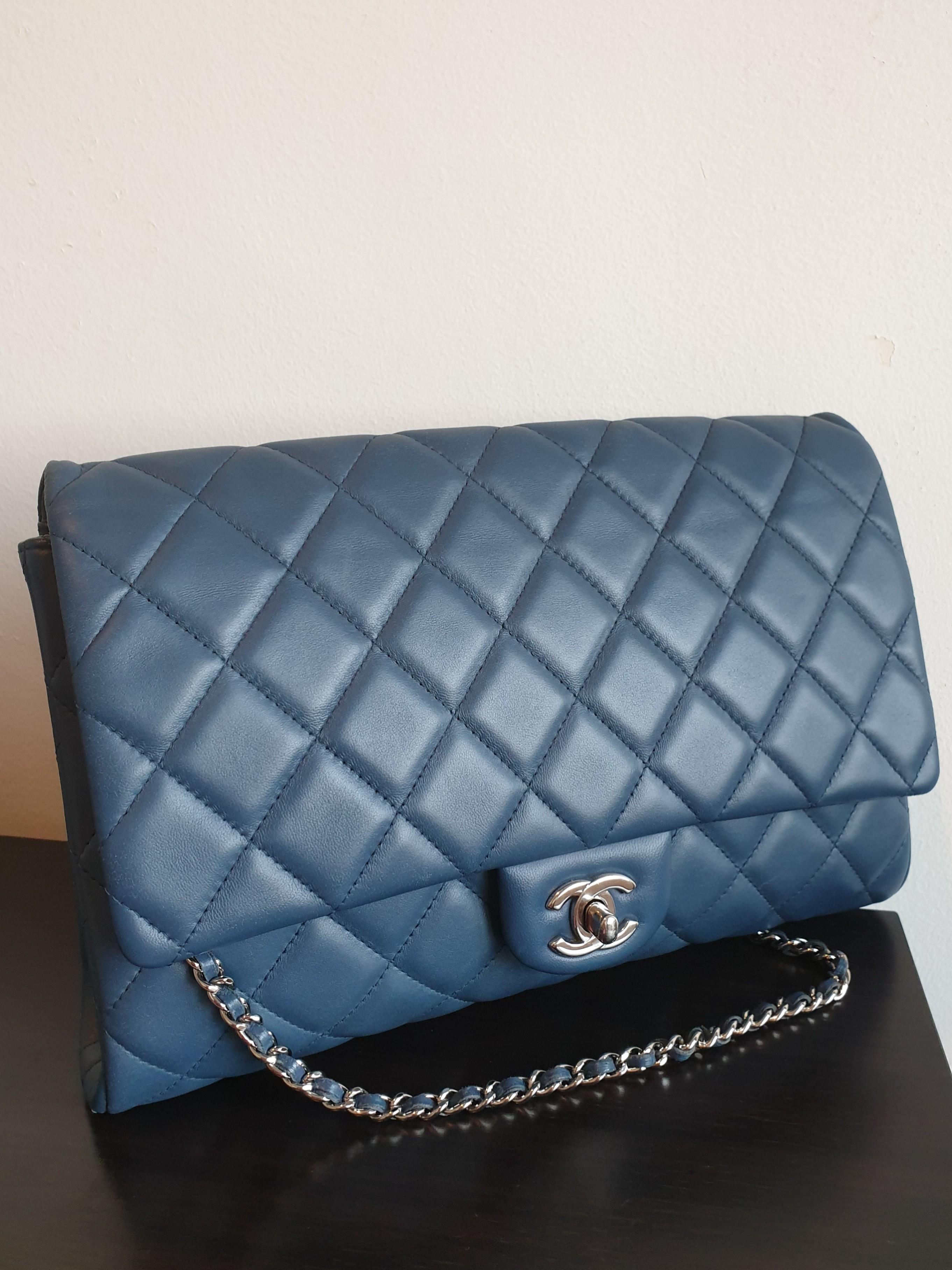 ✓Authentic CHANEL Quilted Clutch with Chain Flap Blue, Luxury, Bags &  Wallets on Carousell