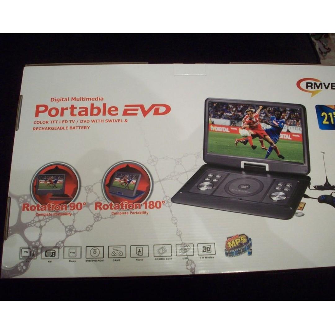 RMVB DIGITAL MULTIMEDIA PORTABLE EVD/DVD PLAYER. 20/21 ...