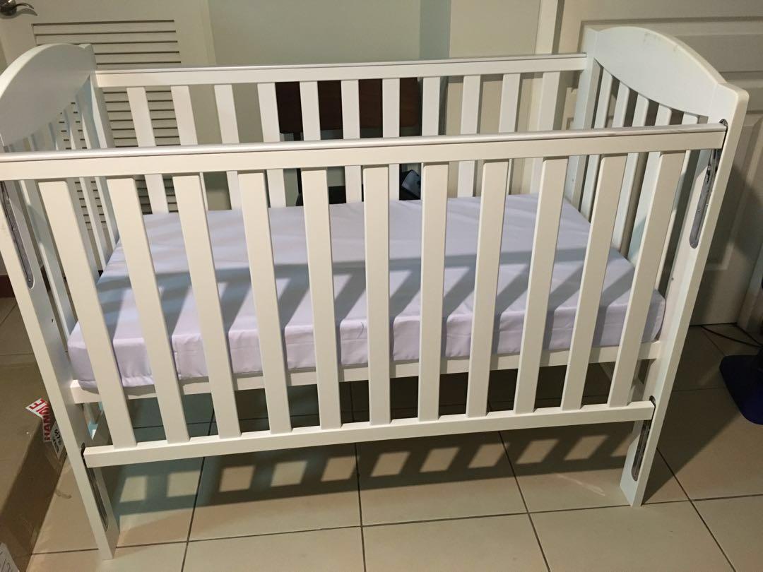Adjustable wooden crib with wheels Babies Kids Baby Nursery