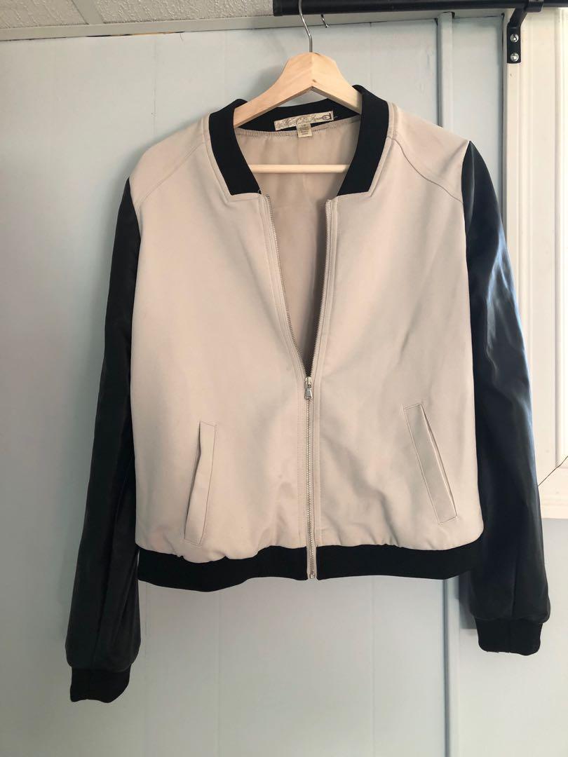 Dynamite jacket (Category: Bags & Wallets) located in Mississauga. Submitted by madeemoore (Listing ID 201045129, Image 1). Description: Size small Leather sleeves silk body Slight discolouration .
