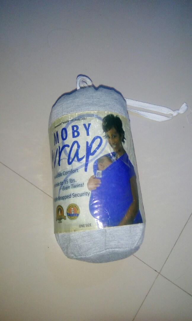Baby wrap & Bath cradle (Category: Other Baby Bathing & Changing Needs) located in Taguig. Submitted by msmarvelcruz (Listing ID 201256006, Image 3). Description: Slightly used In good condition Baby wrap: moby wrap Bath cradle: safety 1st.