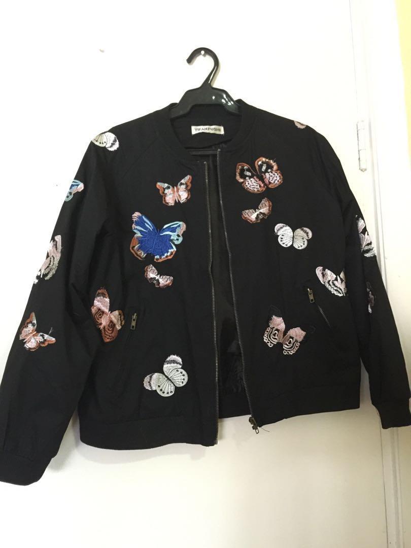 Black bomber jacket with embossed butterfly design Women s Fashion Coats Jackets and Outerwear on Carousell