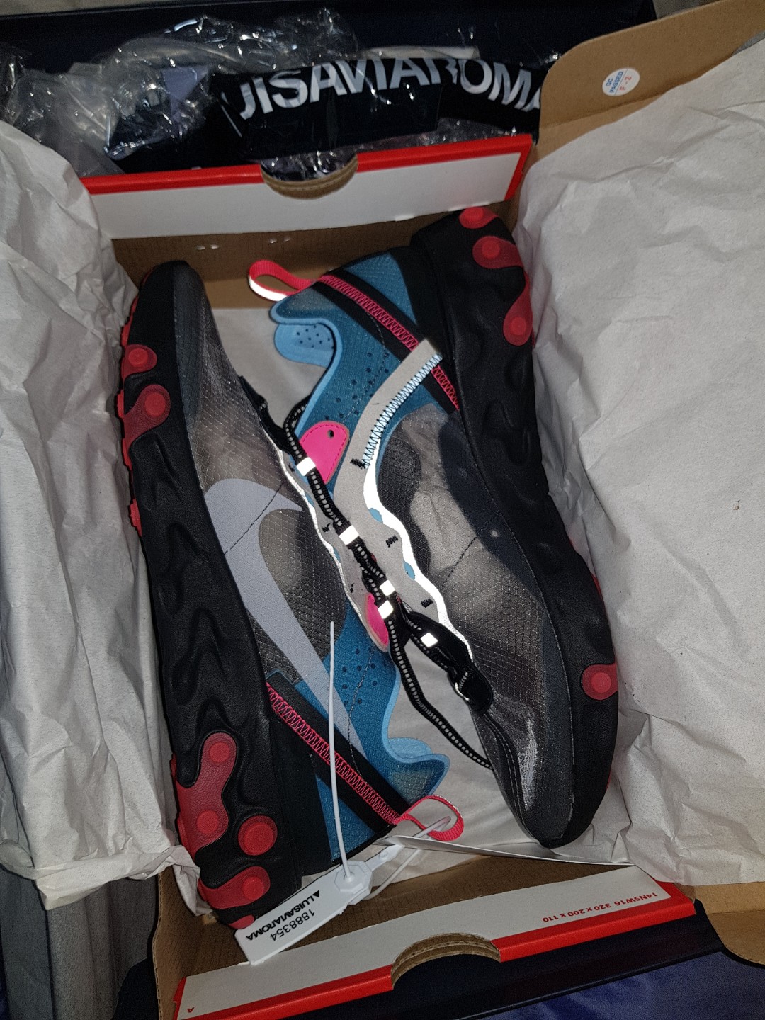 nike react element 87 blue chill solar red on feet