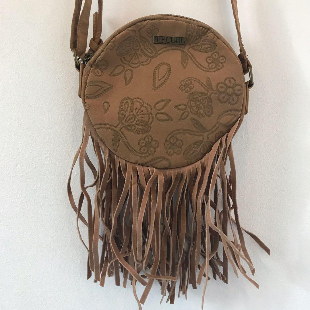 Ripcurl fringe mini crossbody bag (Category: Cross-body Bags) located in Makati City. Submitted by going.minimalist. (Listing ID 201413340, Image 1). Description: Bag is in perfect condition. Used only a few times. Purchased in Ripcurl store in Bali.