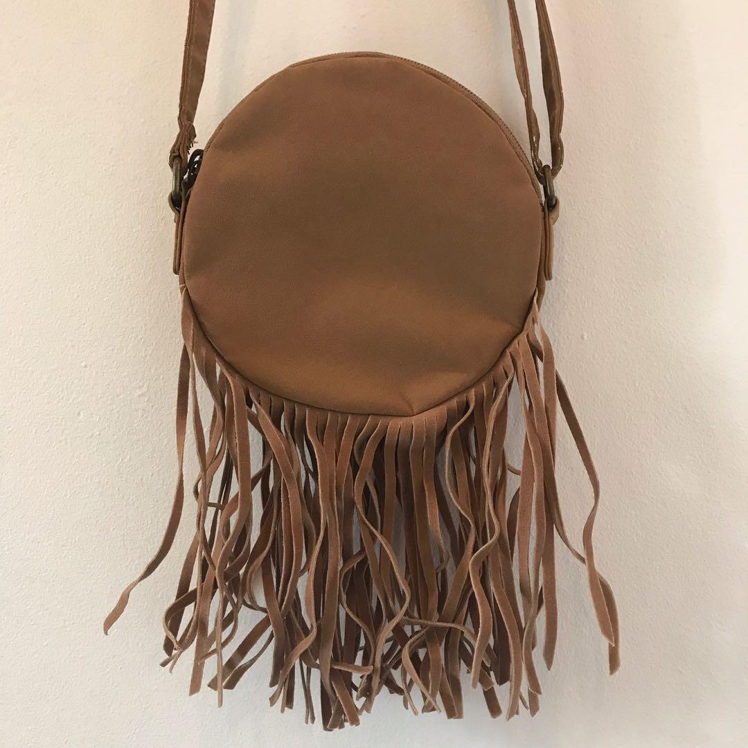 Ripcurl fringe mini crossbody bag (Category: Cross-body Bags) located in Makati City. Submitted by going.minimalist. (Listing ID 201413340, Image 3). Description: Bag is in perfect condition. Used only a few times. Purchased in Ripcurl store in Bali.