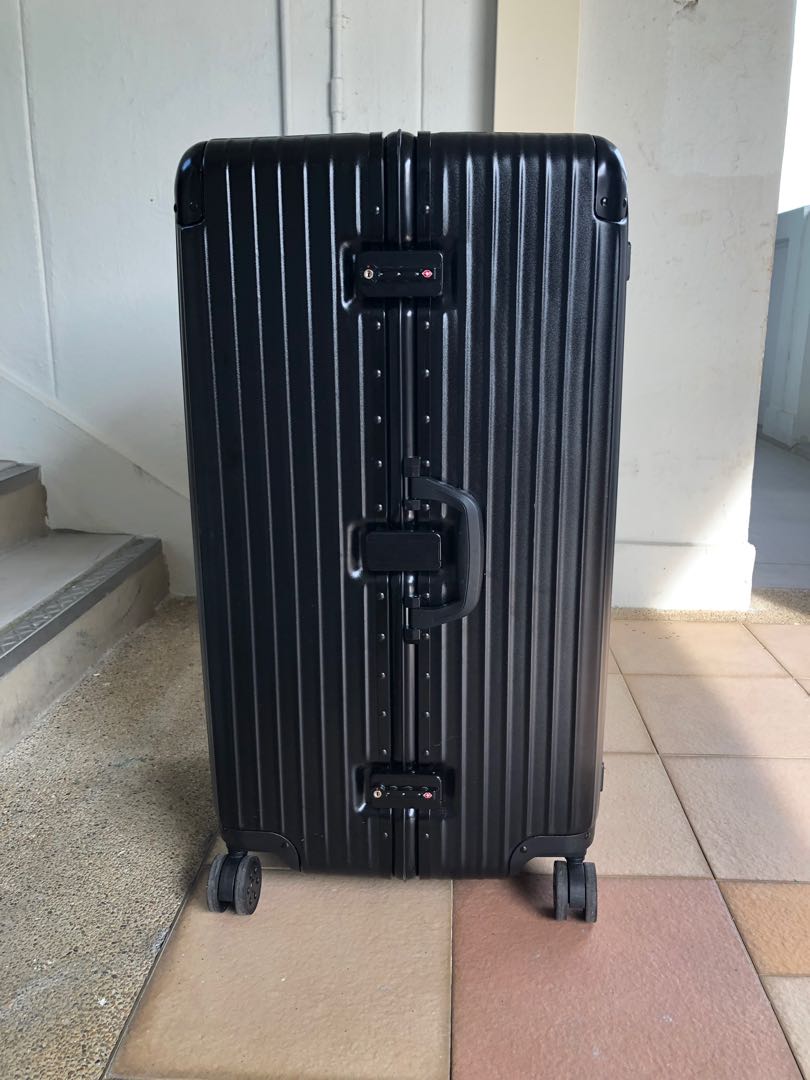 Big black tall luggage Hobbies Toys Travel Luggage on Carousell