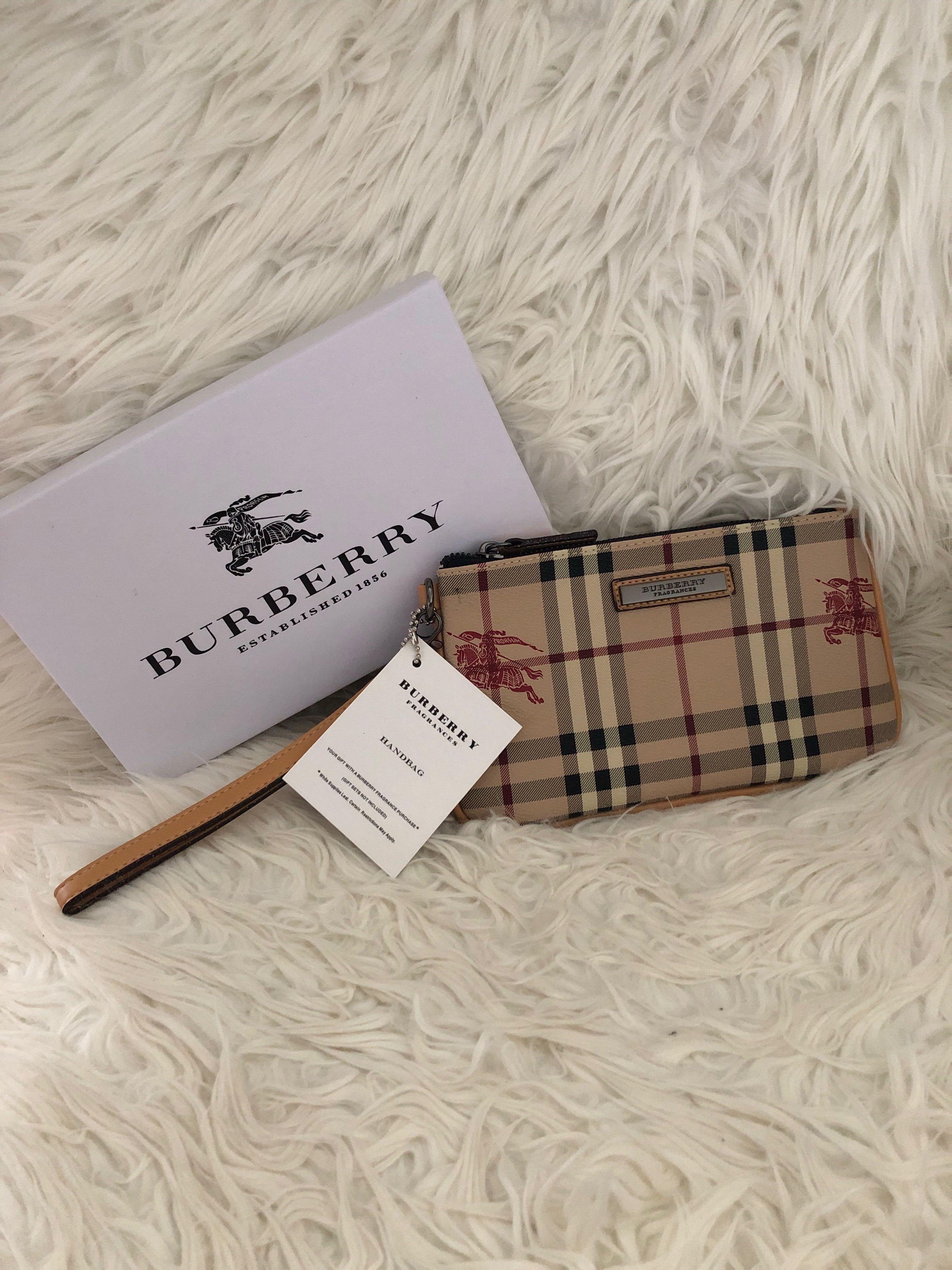 Burberry wristlet, Women's Fashion, Bags & Wallets, Purses & Pouches on  Carousell