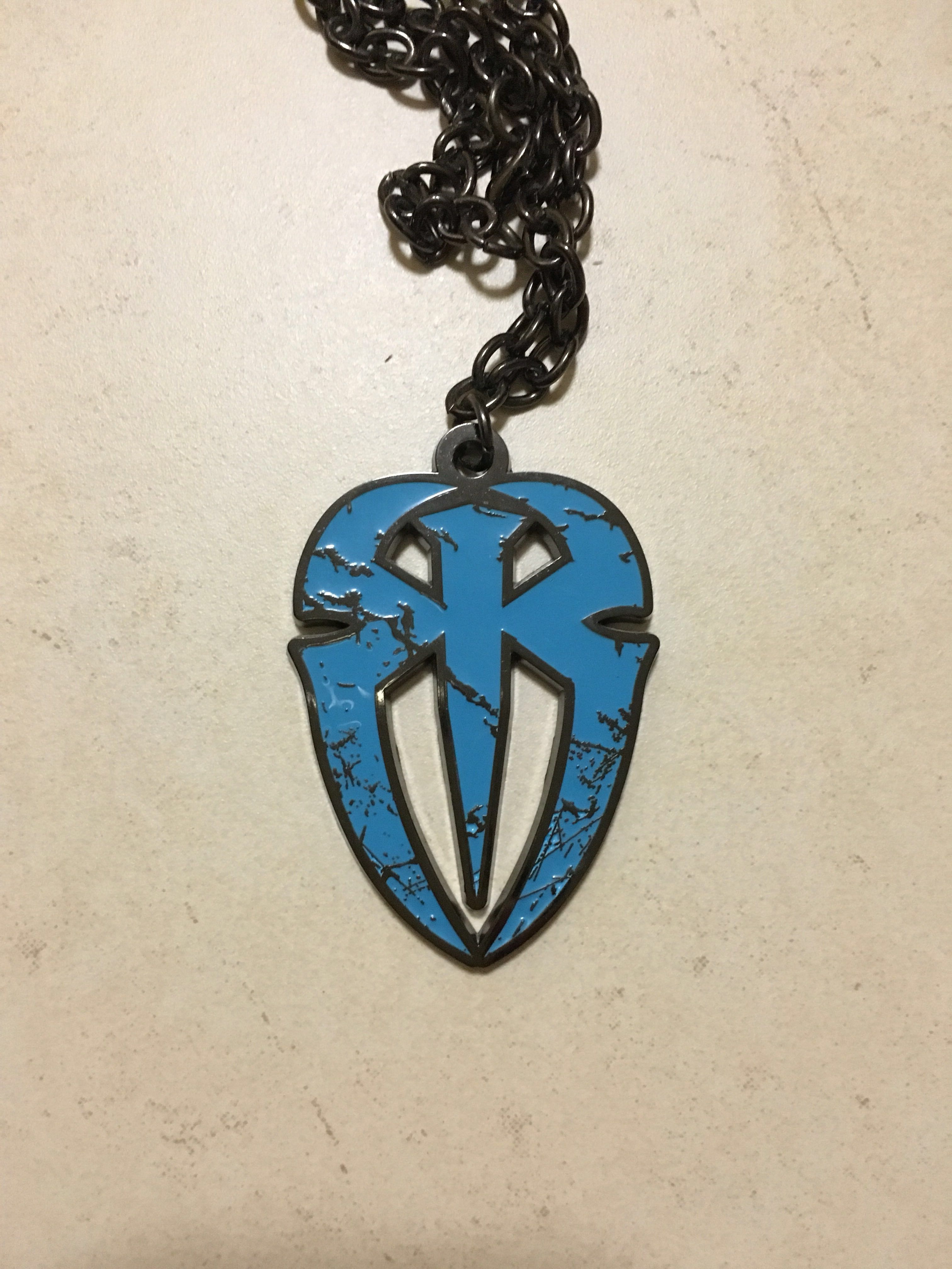 WWE Roman Reigns Necklace, Everything Else on Carousell