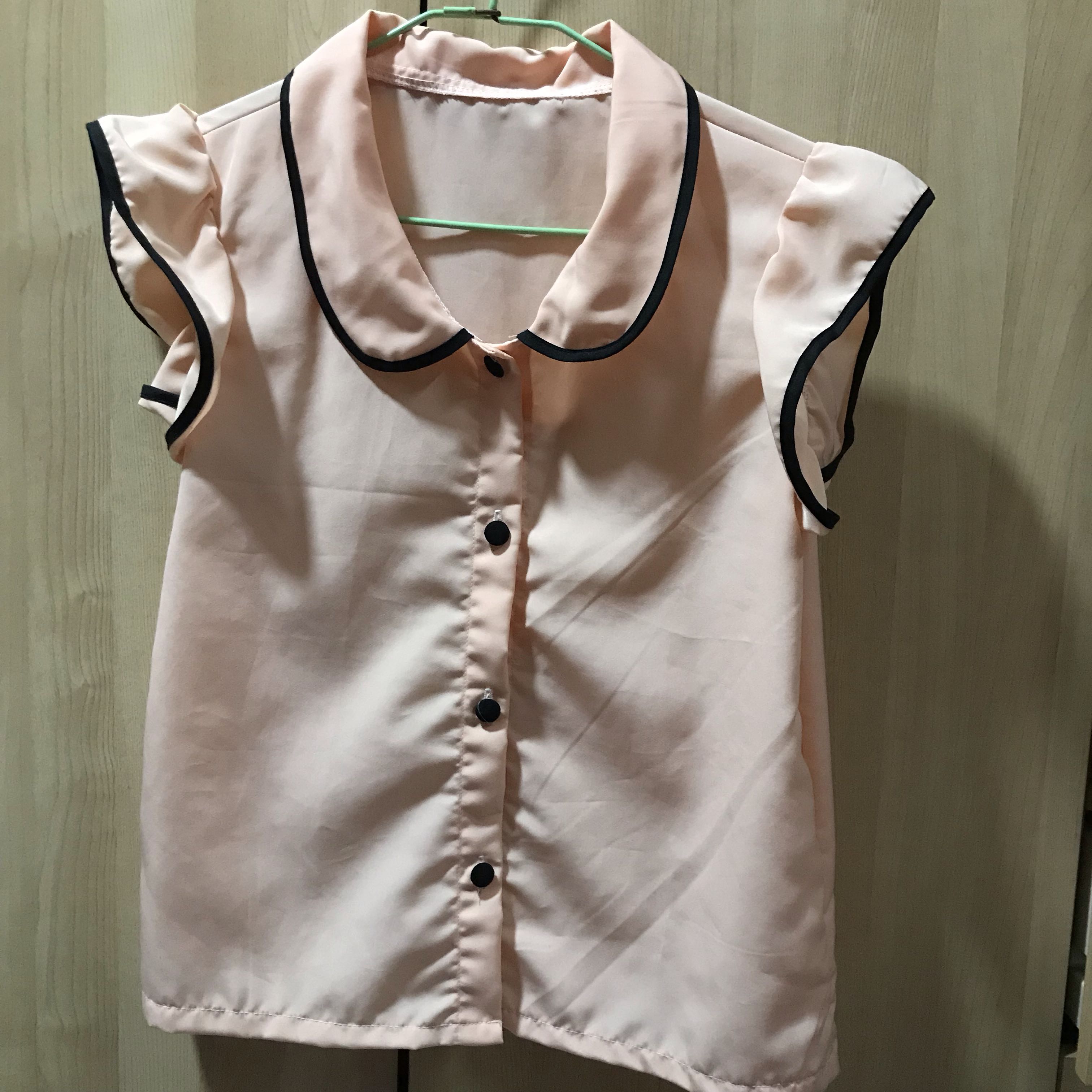 light pink ruffle blouse