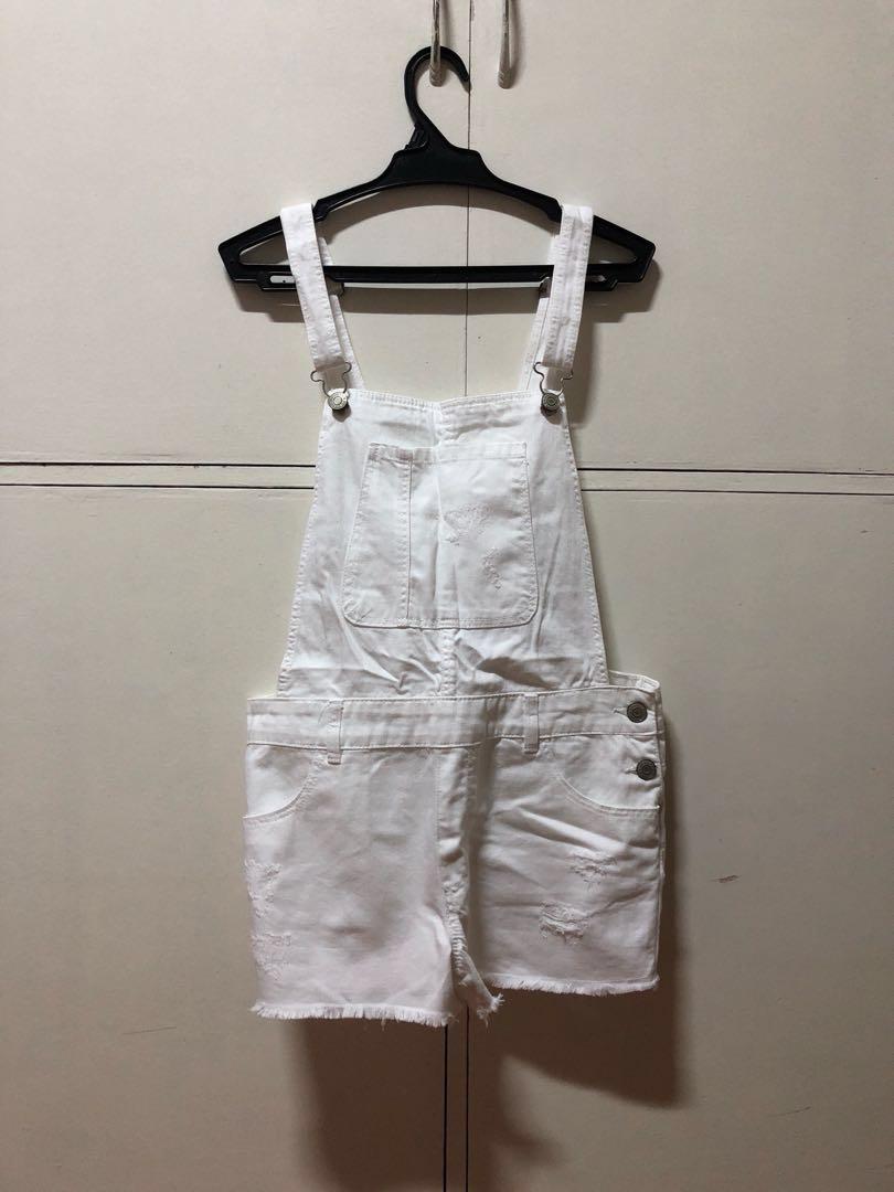 white jumper and jeans