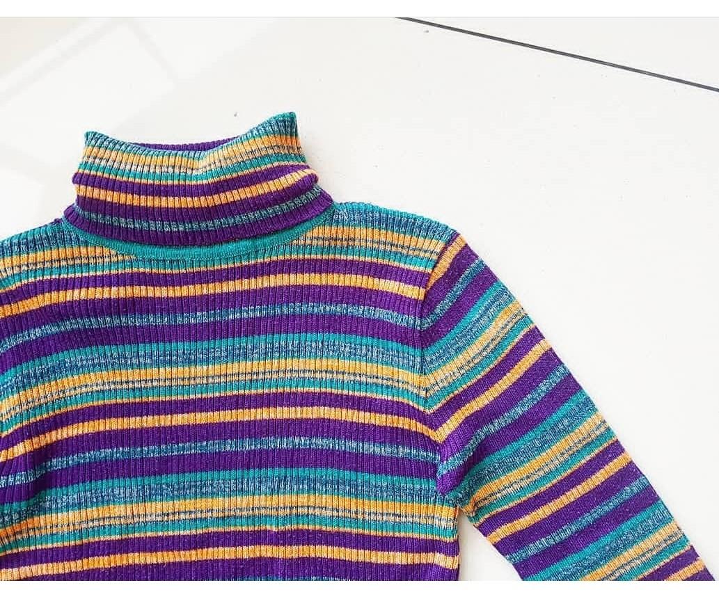 Colorful Stripes Turtleneck (Category: Blouses) located in Quezon City. Submitted by mostly99 (Listing ID 202253254, Image 2). Description: Swipe for Close Up! Colorful Stripes Pullover 80 pesos only Fits S-M 🤷🏻‍♀️Thrifted but never used, like new..