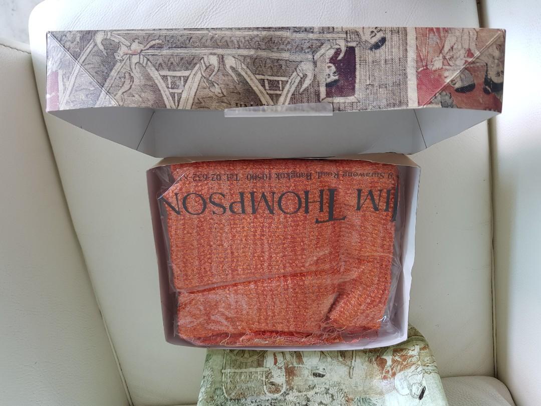 JIM THOMPSON Scarf (Category: Scarves) located in Singapore. Submitted by lolorotceig (Listing ID 202259356, Image 2). Description: Handwoven Silk Linen Scarf Color: Orange/Multi 80% Silk 20% Linen Still in its original package. NEVER worn Currently sold at 132 SGD retail price.