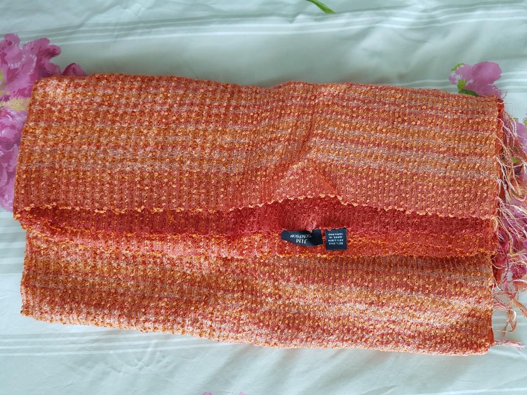 JIM THOMPSON Scarf (Category: Scarves) located in Singapore. Submitted by lolorotceig (Listing ID 202259356, Image 3). Description: Handwoven Silk Linen Scarf Color: Orange/Multi 80% Silk 20% Linen Still in its original package. NEVER worn Currently sold at 132 SGD retail price.