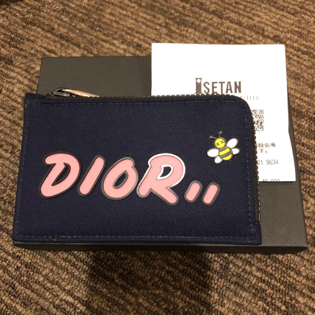 authentic dior homme x kaws card and coin holder, men's fashion, watches & accessories, wallets & card holders on carousell authentic dior homme x