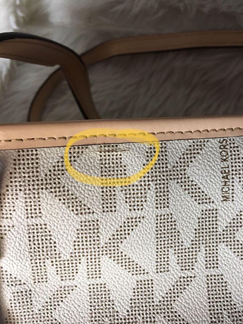 Authentic overrun Michael Kors Neverfull with minor flaw show in