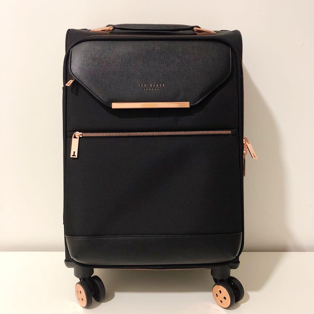 Black rose sales gold luggage