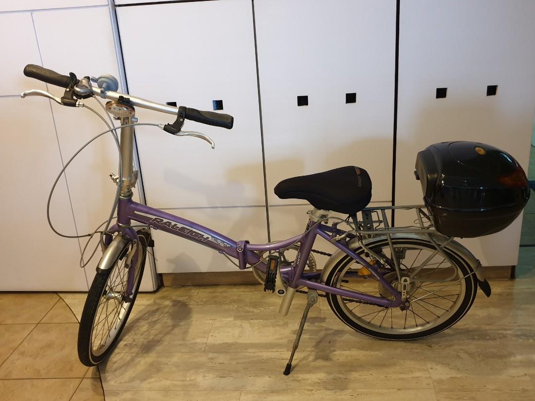 Foldable 20 inch diameter bicycle come with rear storage box. 7
