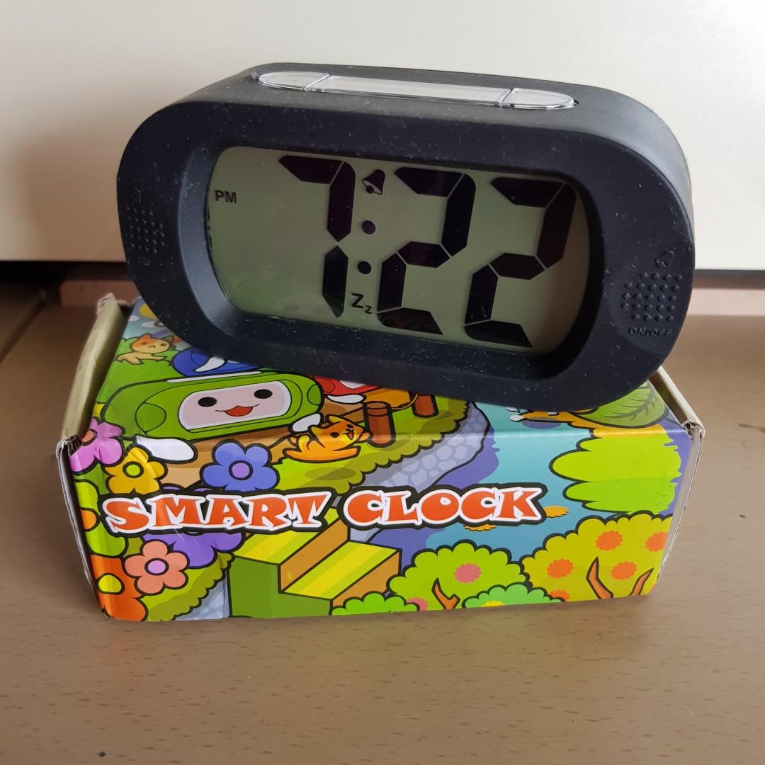Smart clock (Category: Clocks) located in Singapore. Submitted by rclk11 (Listing ID 202411045, Image 1). Description: Clock with alarm.