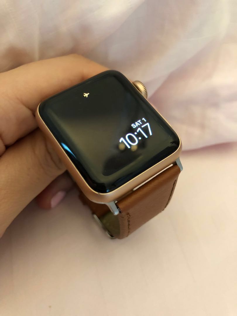 gold aluminium case with pink sand sport band