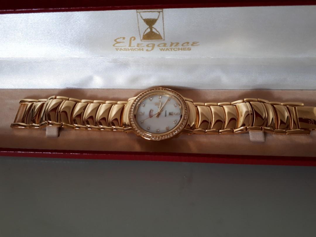 Price reduced Elegance 23K Gold plated Swiss Quartz with Sapphire