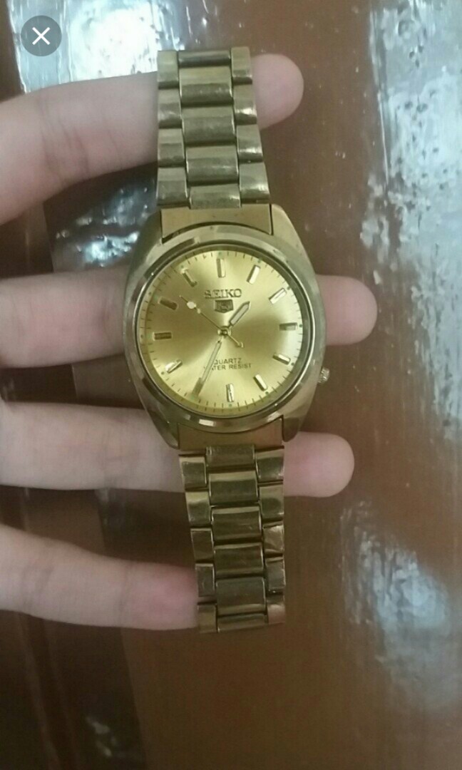 Jam top seiko gold