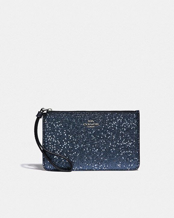 Coach star cheap glitter wristlet