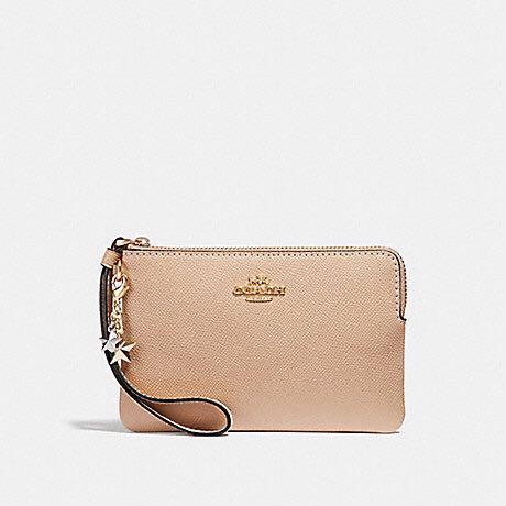 beige wristlet