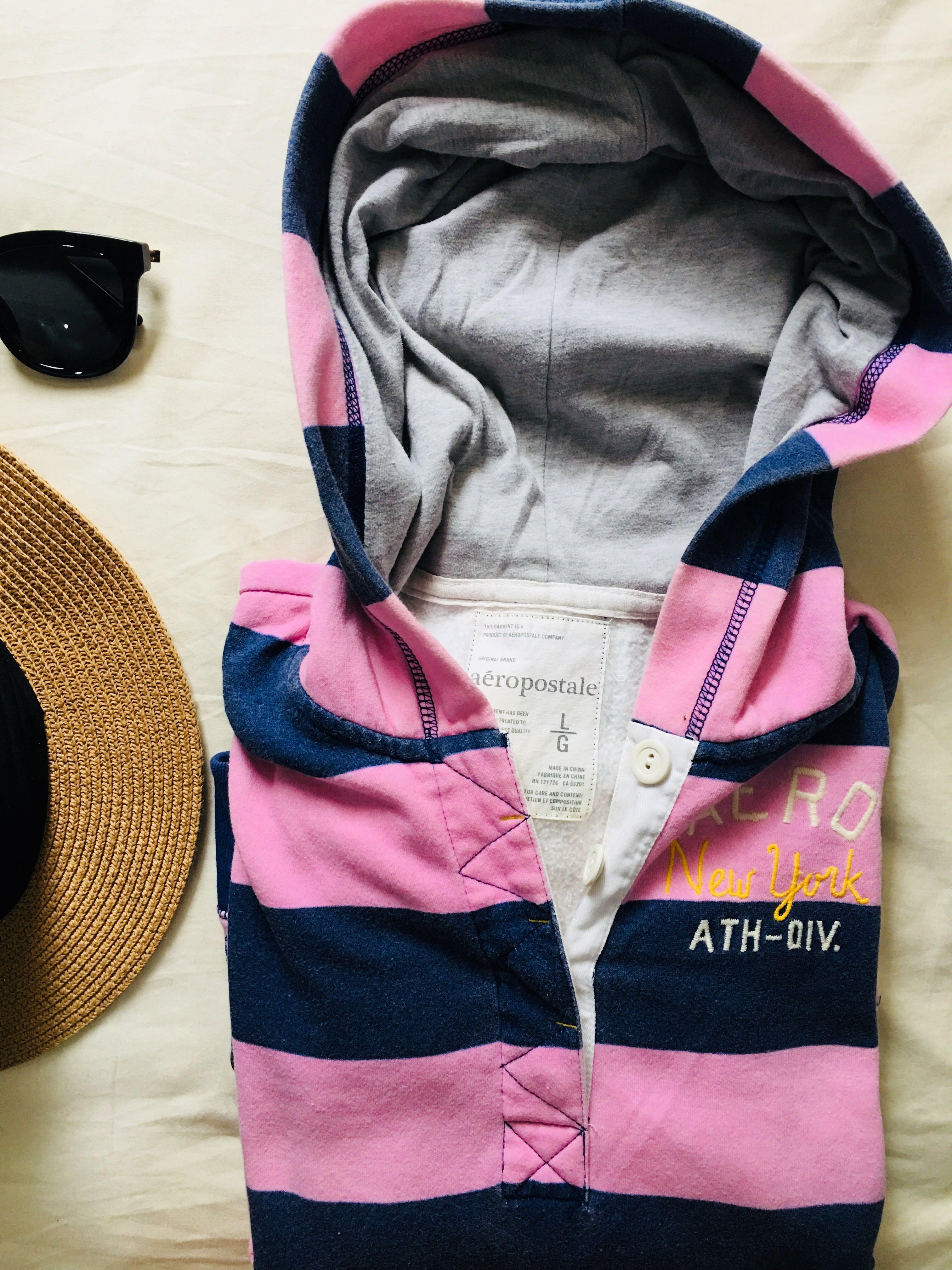 Authentic Aeropostale Hoodie Sweater (Category: Coats, Jackets and Outerwear) located in Taguig. Submitted by impulsivemoims (Listing ID 184478599, Image 1). Description: Authentic Aeropostale Hoodie Sweater Color/Print: Stripe Pink/blue Size on tag: L Fits M-L Bought in the US Condition: 10/10 (lint on the letters but totally washable) RFS: decluttering ✅discounts for multiple orders #carousweldo.