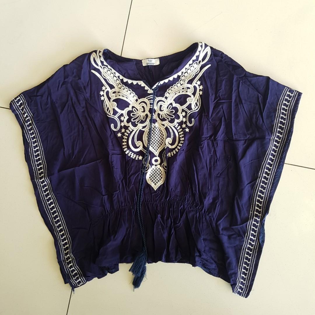 Bangkok Flowy Embroidered Top (Category: Blouses) located in Quezon City. Submitted by mostly99 (Listing ID 202778533, Image 1). Description: Original price 600 pesos. With minimal flaw, needs a little stitching. Made in Thailand. Embroidered. Fits S-L.
