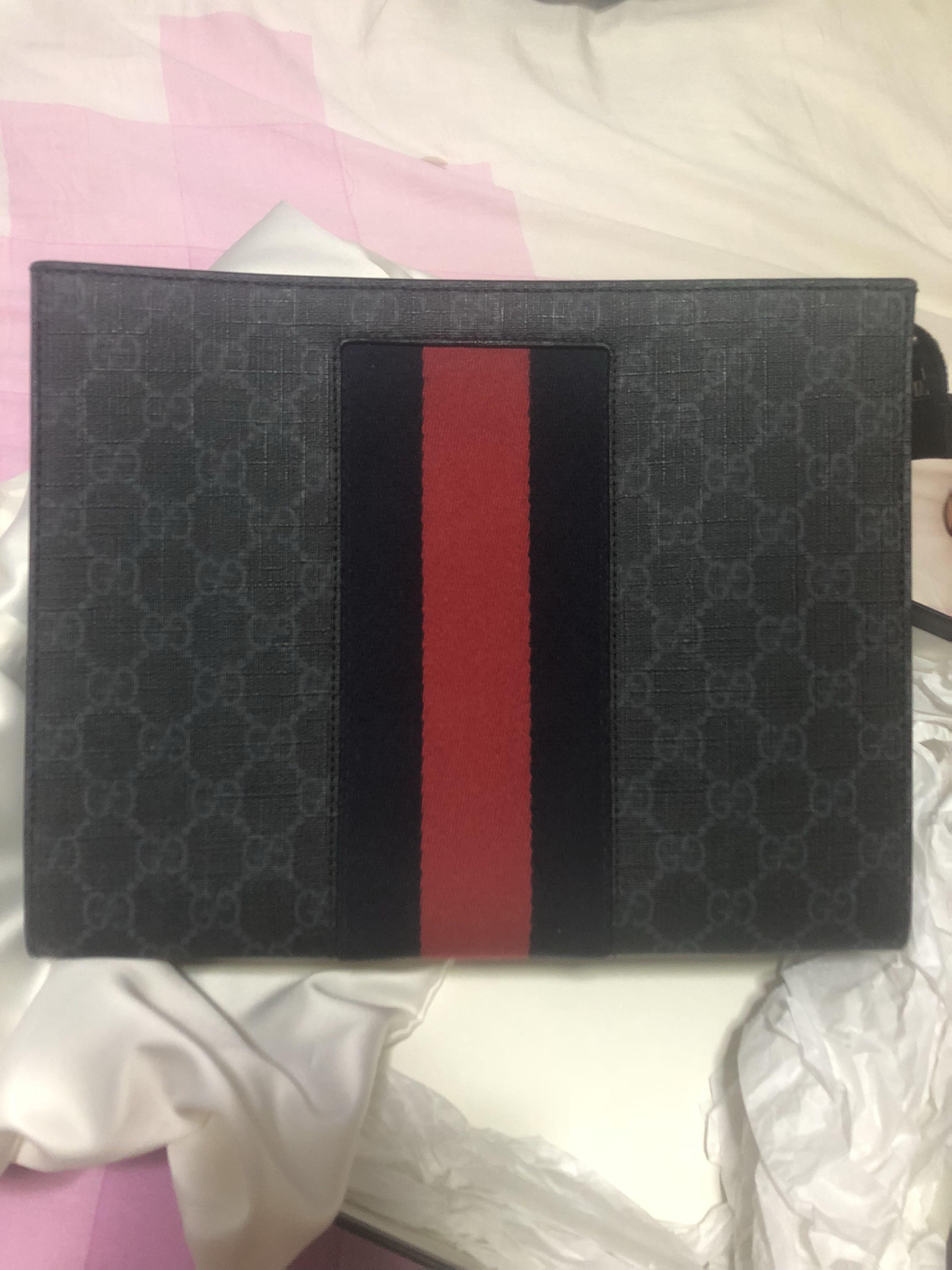 gucci supreme web pouch