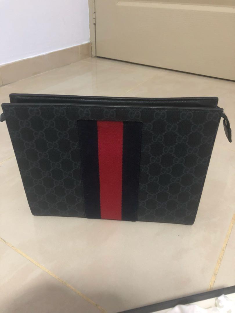 gucci supreme web pouch