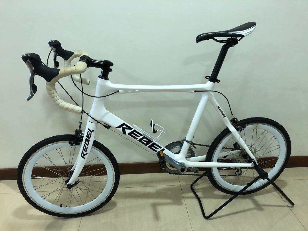 White 16 speed road bike with small wheels