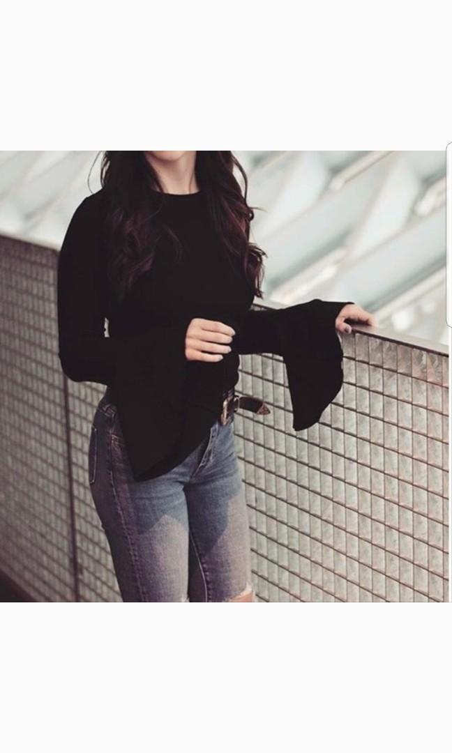 black top with flared sleeves