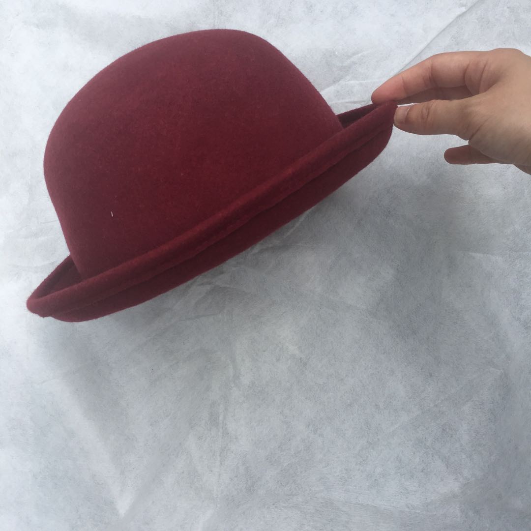 maroon bowler hat