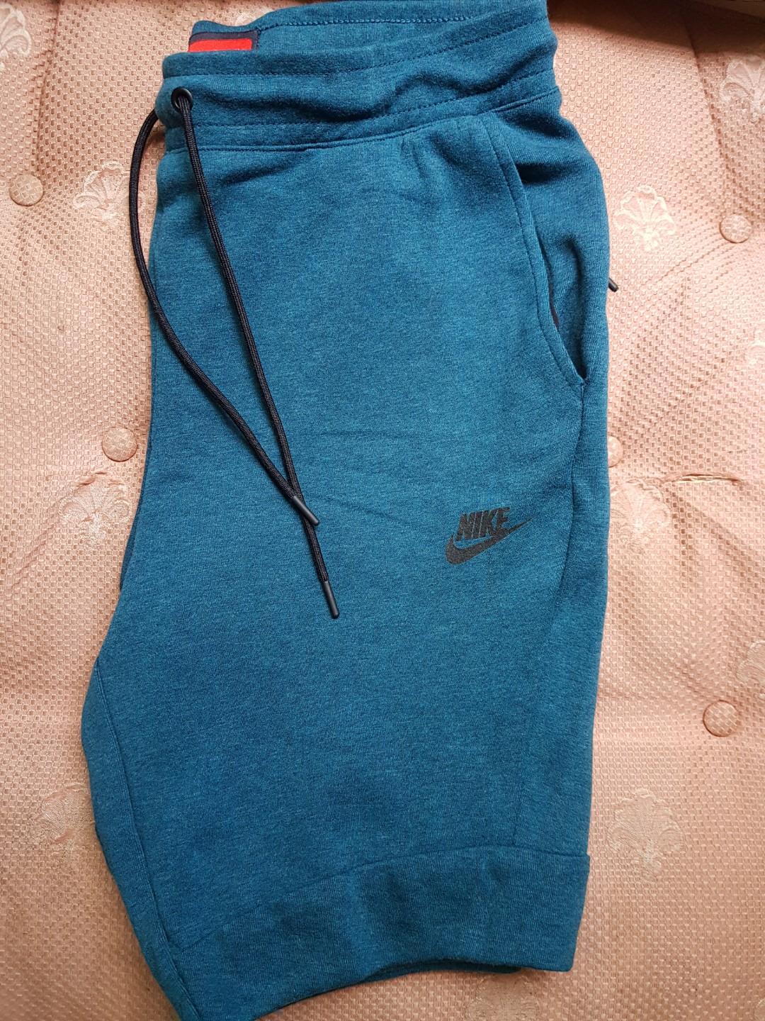 nike tech fleece shorts green