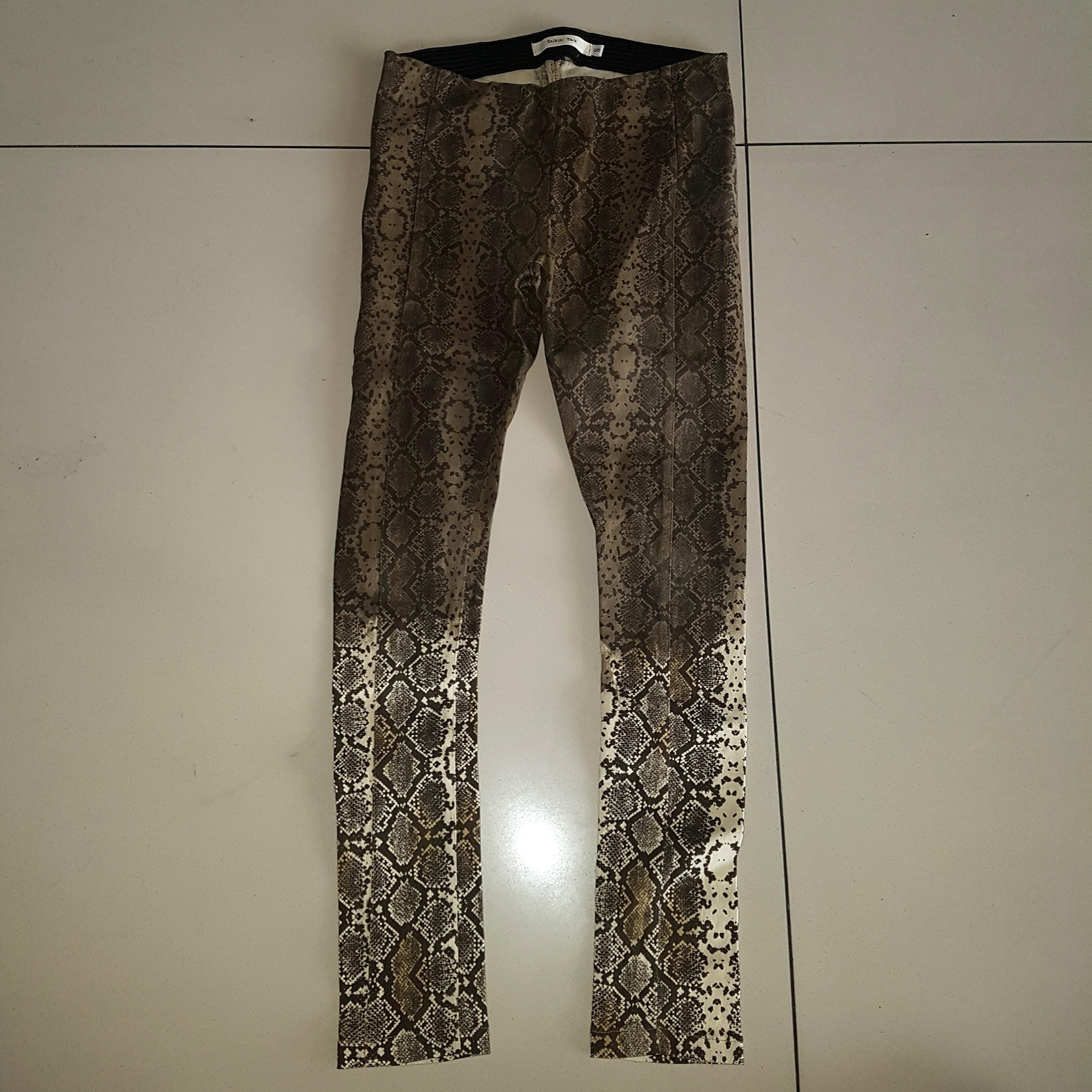 Snakeskin Print Jeggings (Category: Jeans) located in Quezon City. Submitted by mostly99 (Listing ID 203099243, Image 1). Description: New. Fits XS-SM.
