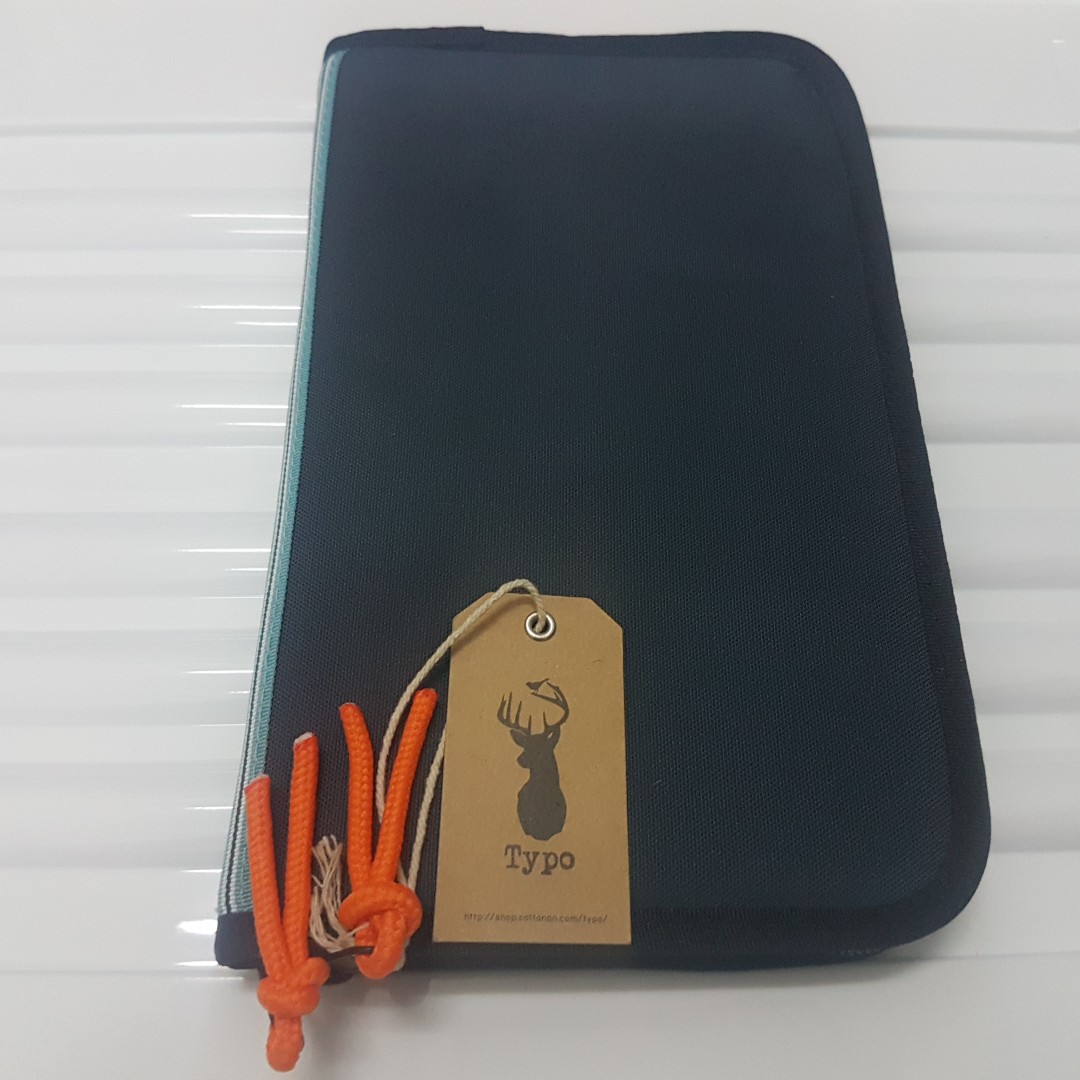 Typo travel wallet and document holder, Women's Fashion, Bags & Wallets