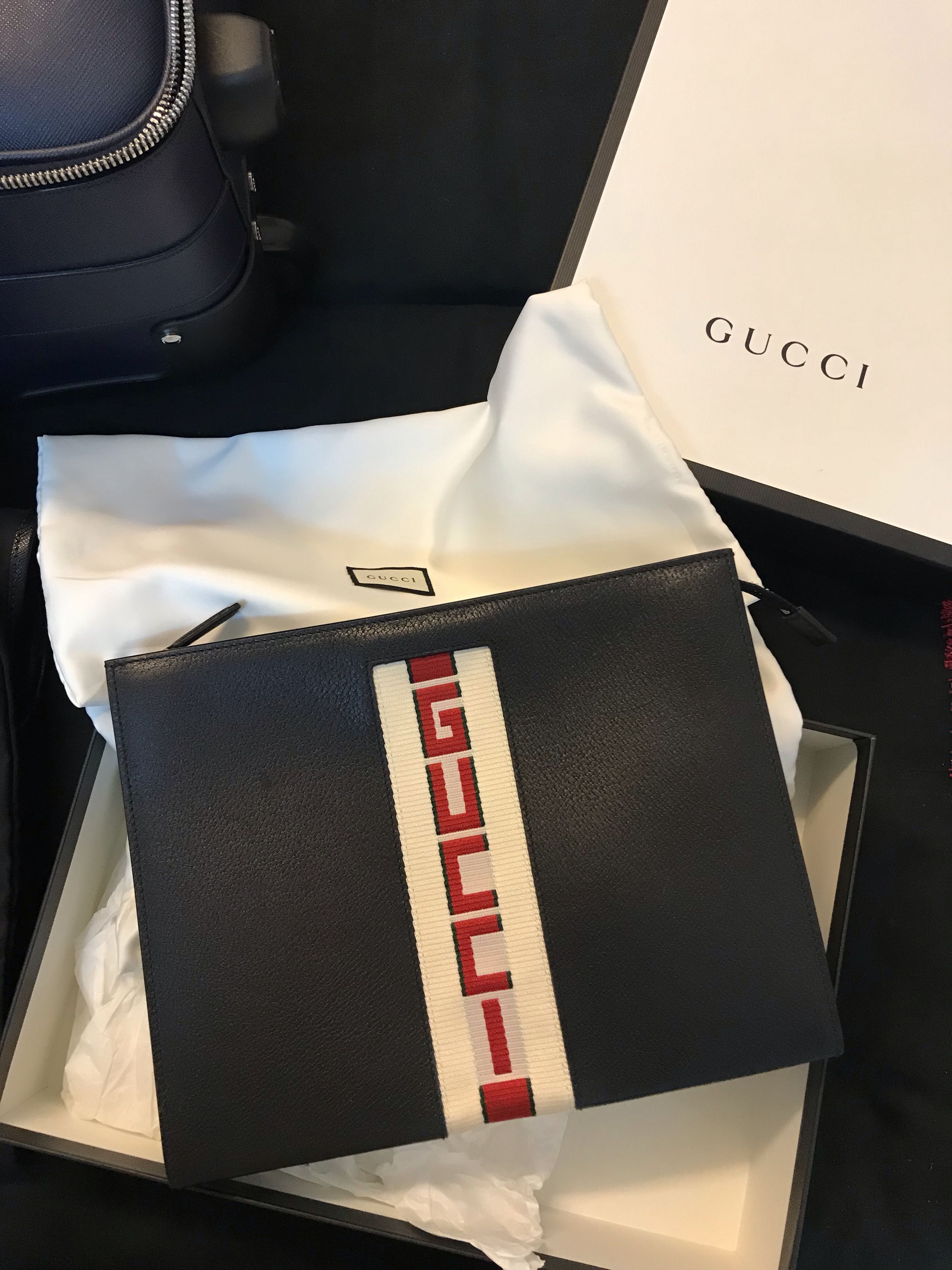 Gucci stripe leather pouch discount
