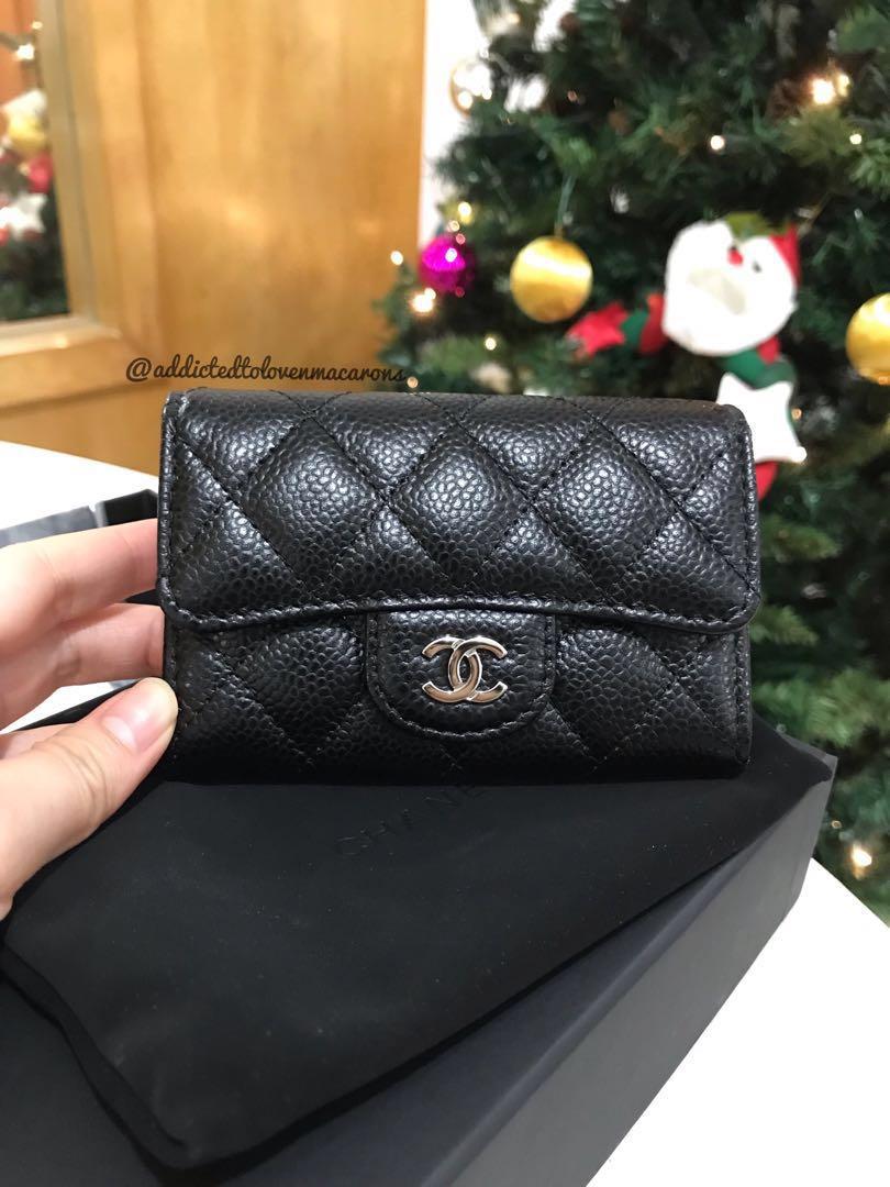 Classic Chanel cardholder in black with silver hardware