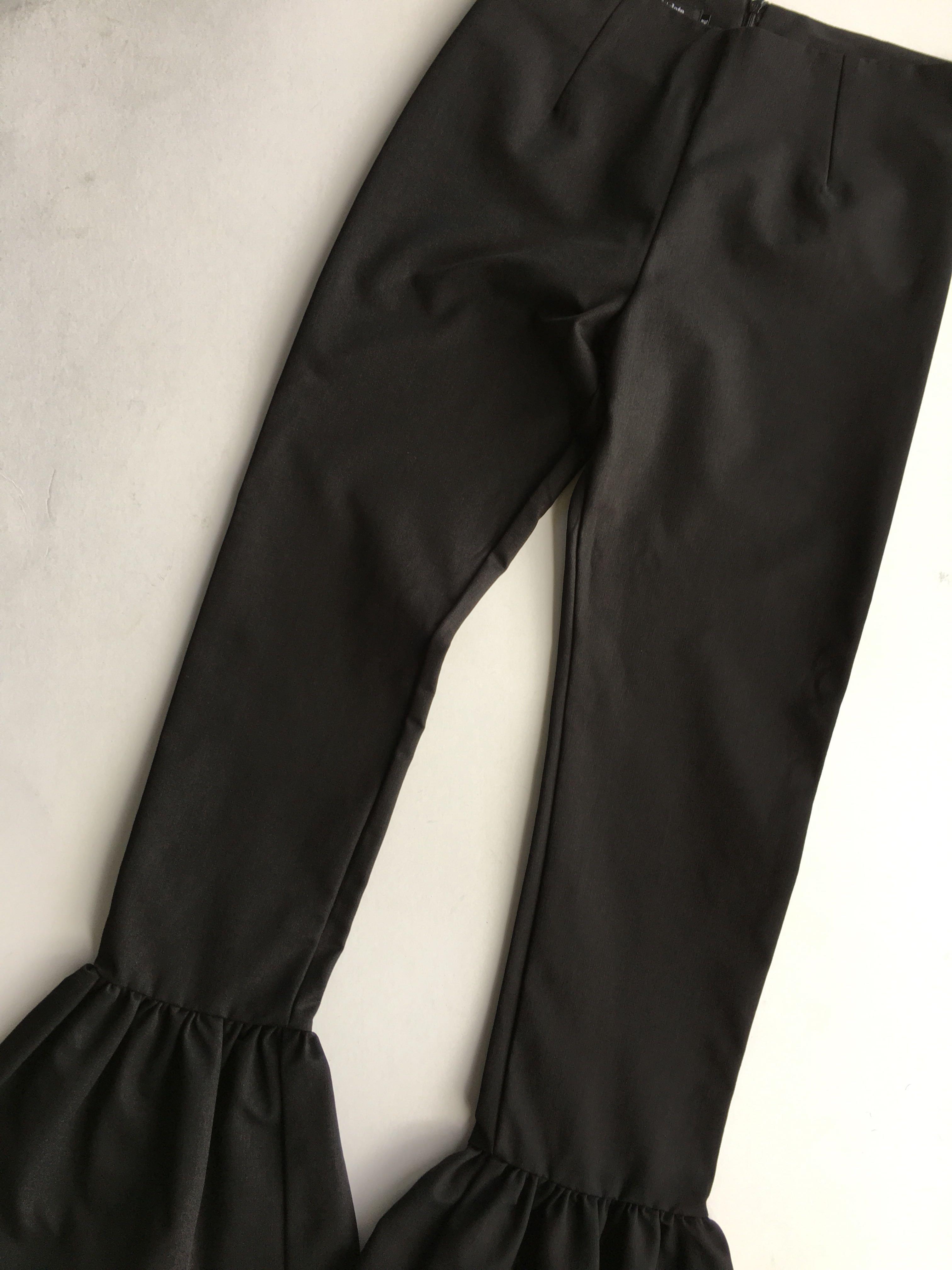 jeans with ruffles on the bottom