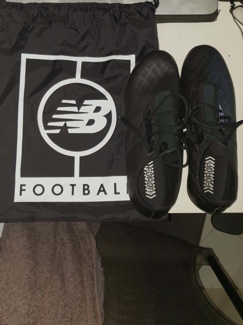 new balance black football boots