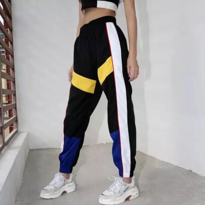 black joggers with blue stripe