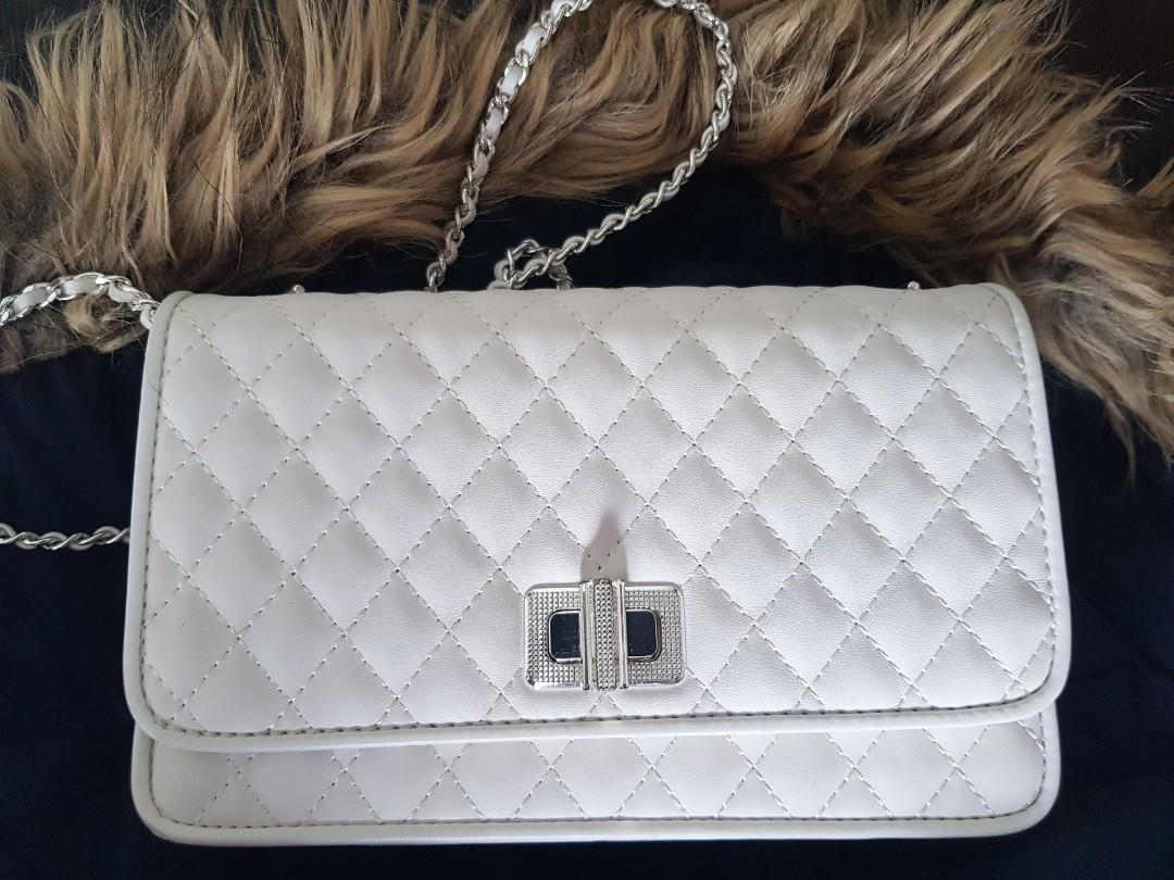 Quilted clutch sales charles and keith