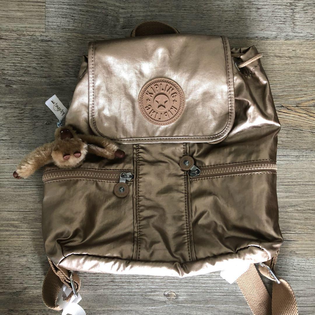 Kipling gold backpack best sale
